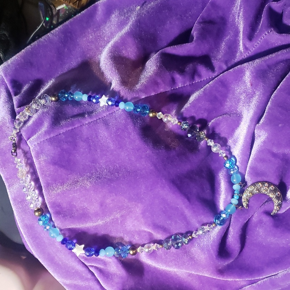 Glass moon pendent necklace
